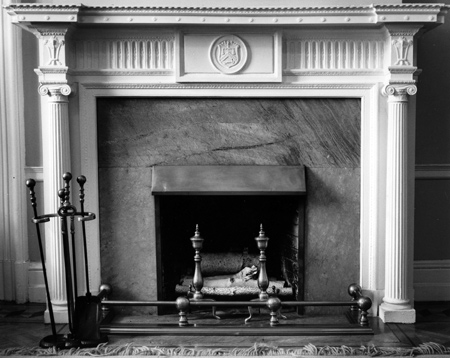 Black and white image of fireplace.
