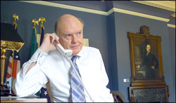 Secretary Snow conducts an office call from his office during his first week as the Treasury Secretary.