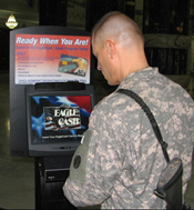 Photo: A U.S. soldier uses an EagleCash kiosk in Al Faw Palace, formerly owned by Sadaam Hussein, near Baghdad, Iraq.