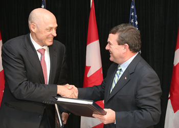 Photo: Paulson Travels to Quebec to Sign Updated U.S.-Canada Tax Treaty