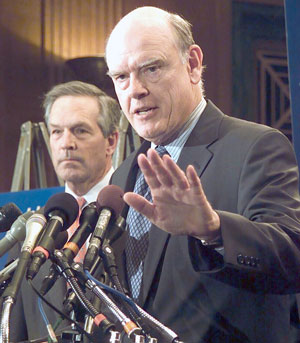 Treasury Secretary John Snow joins House and Senate leaders at a press conference on Capitol Hill to promote President Bush's jobs and growth package