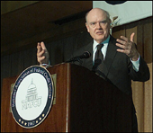 Photo: Secretary John W. Snow gives remarks to the National Association of Federal Credit Unions 