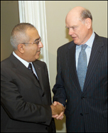 Treasury Secretary John Snow greets Palestinian Minister of Finance Salam Fayyad
