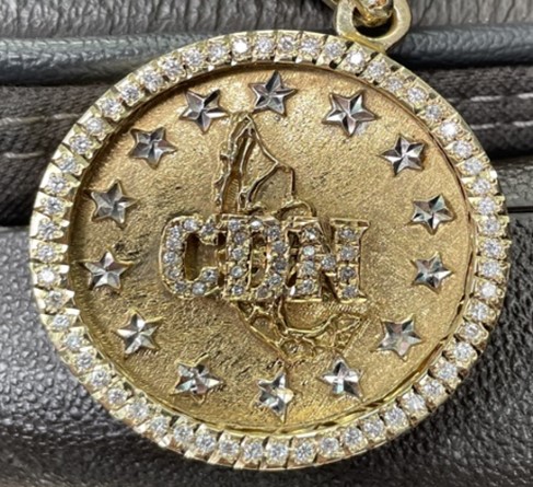 CDN medallion possessed by members of the arms trafficking conspiracy.