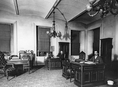 black and white photograph of a clerks room inside the san francisco mint