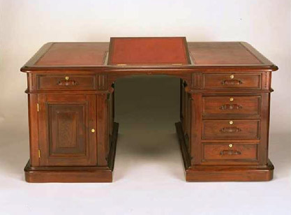Color photograph of a restored desk from the San Francisco Mint