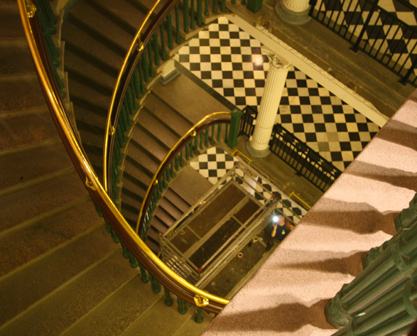 Color photograph of spiral staircase in the Treasury building.